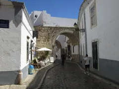 A street in Faro's old town leading to the castle's Albarrana tower